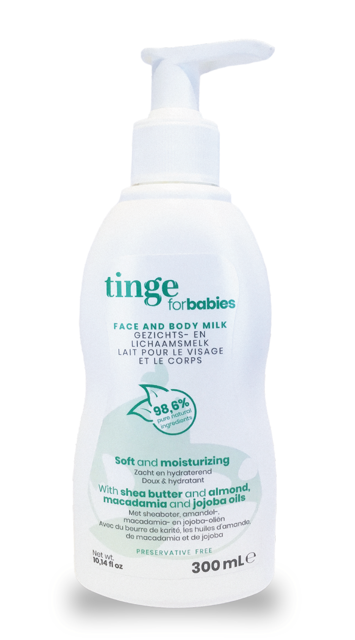 tinge face and body milk for babies bottle on a white background