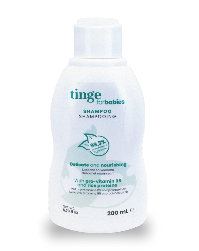 tinge shampoo for babies bottle on a white background