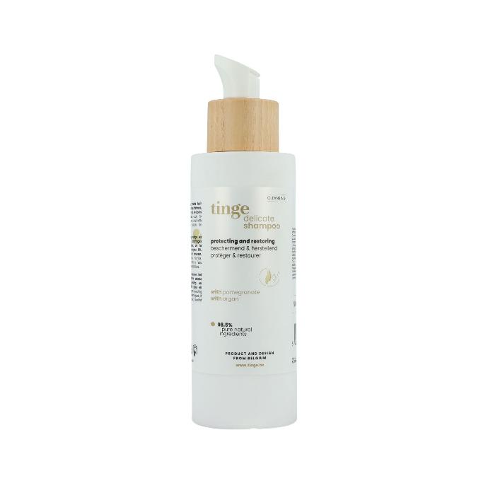 tinge delicate shampoo tinge delicate shampoo bottle on a white background