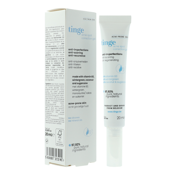 tinge acne spot correction gel tube and packing on a white background