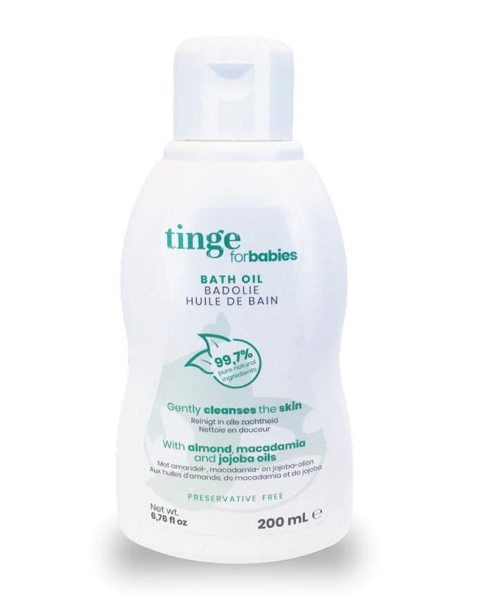 tinge bath oil for babies bottle on a white background